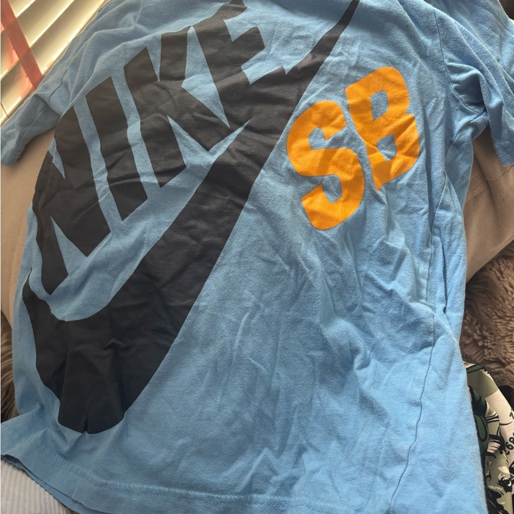 Nike SB Sky Blue Tee with Black and Yellow Logo